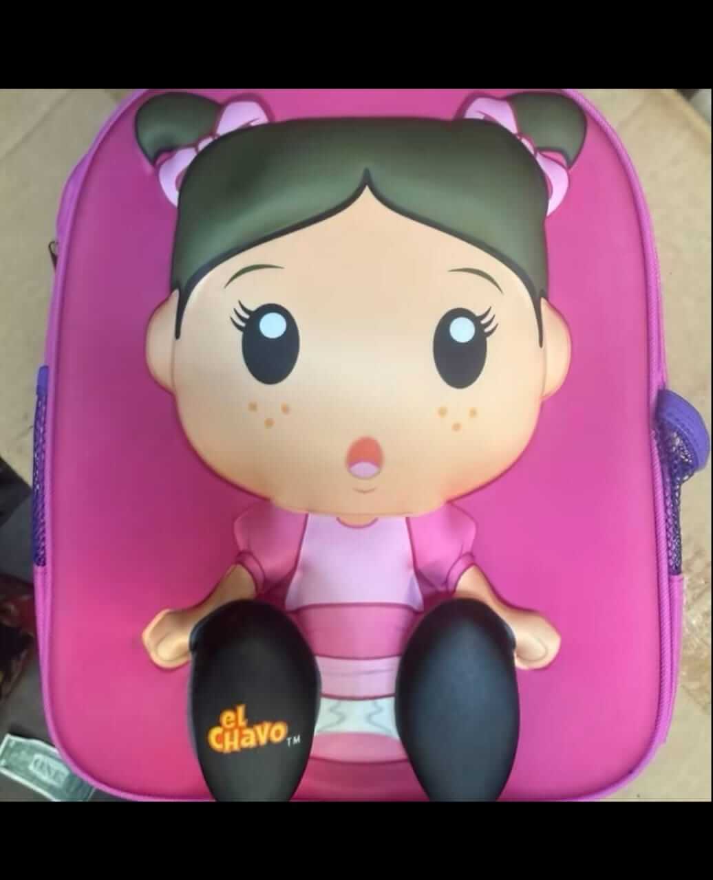 Colorful El Chavo del Ocho 3D backpack featuring a character design in pink, perfect for kids.
