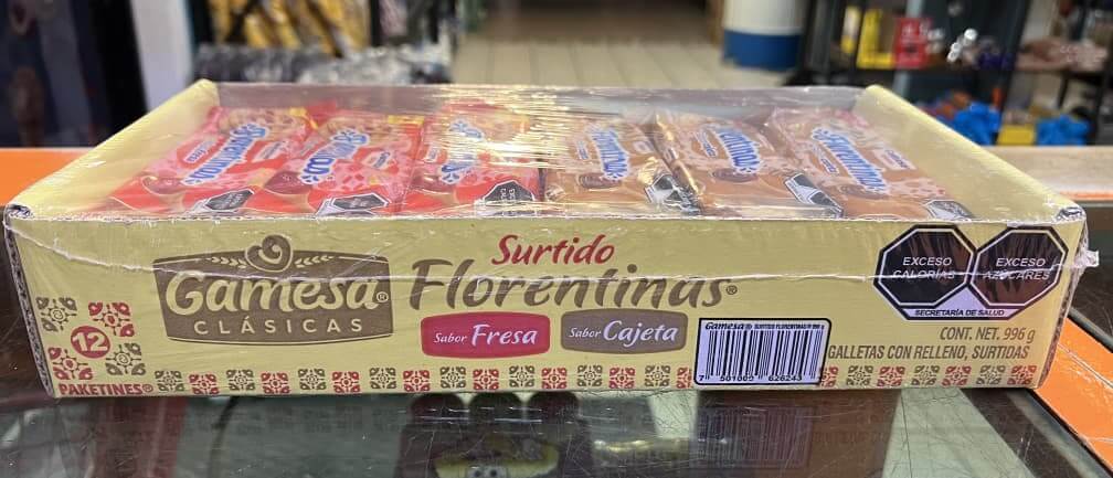 Gamesa Florentina Surtido pack featuring 12 cookies: 6 strawberry and 6 cajeta flavors, showcasing Mexican sweetness.